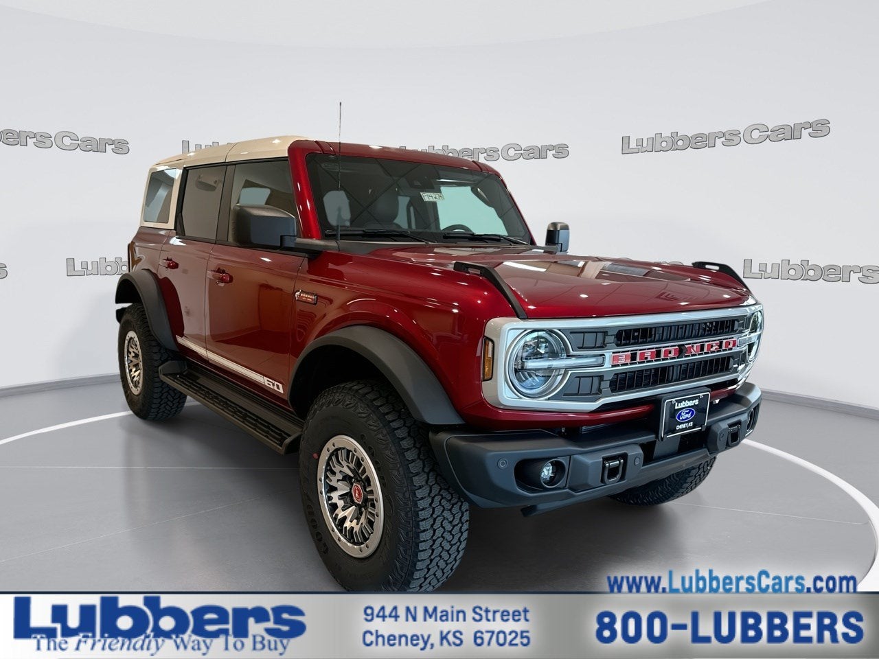 2026 Ford Bronco Outer Banks in Ruby Red Met Tntd Clearcoat — front three-quarter view