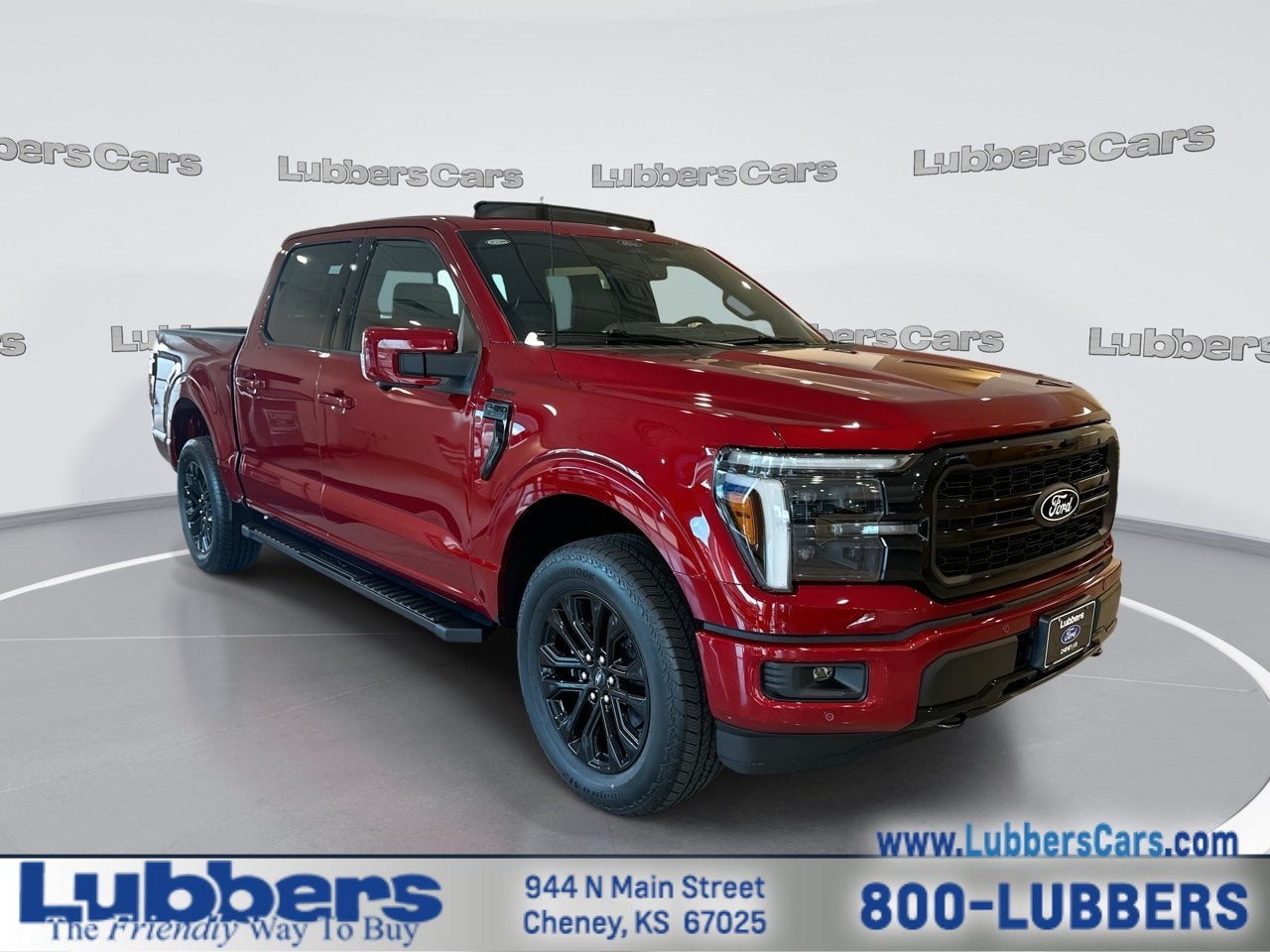 2026 Ford F-150 LARIAT in Ruby Red Metallic — front three-quarter view