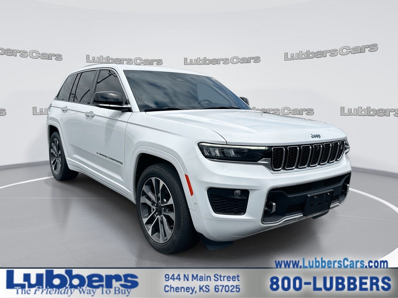 2022 Jeep Grand Cherokee Overland in Bright White Clearcoat — front three-quarter view