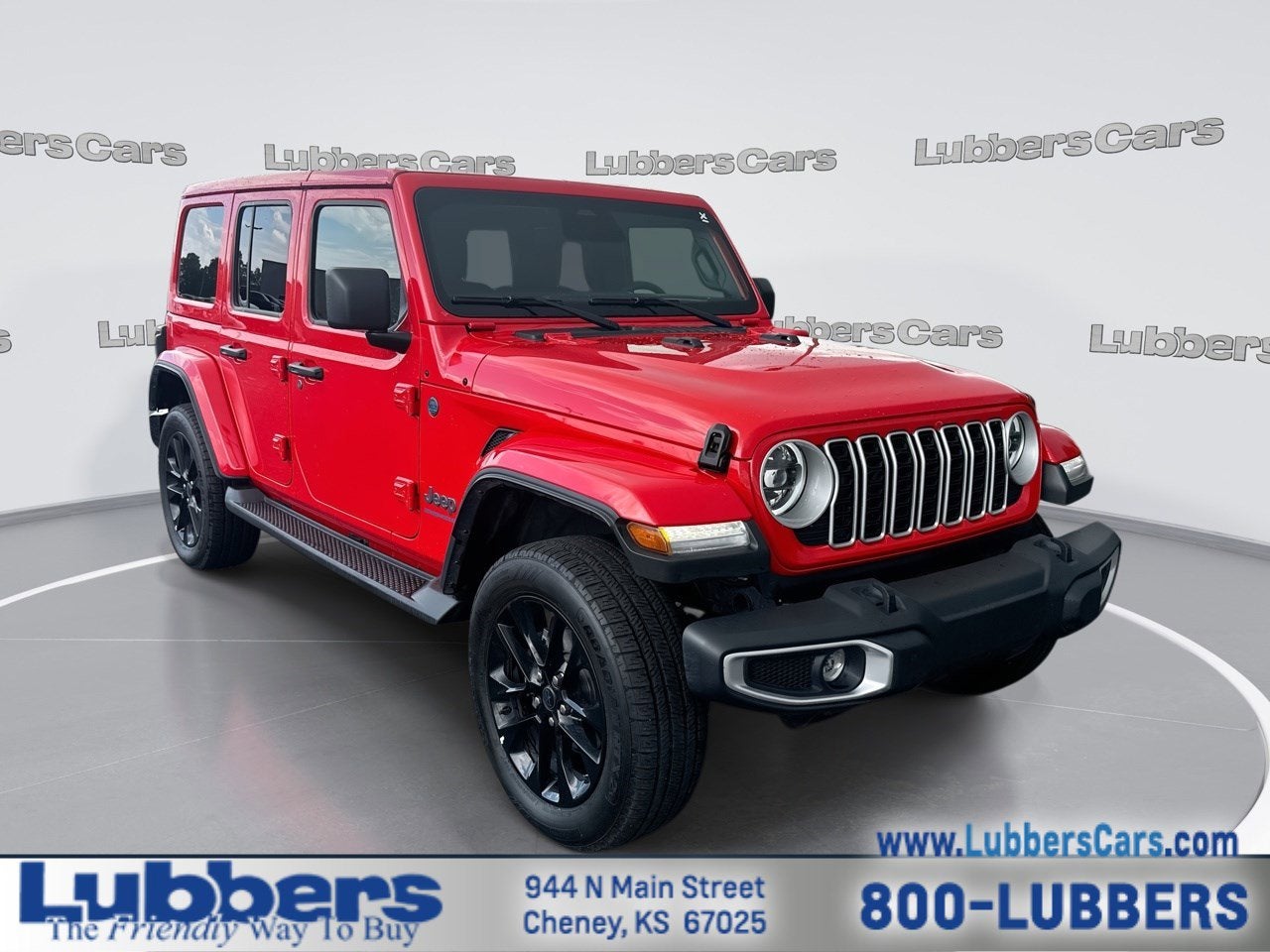 2025 Jeep Wrangler 4xe Sahara in Firecracker Red Clearcoat — front three-quarter view